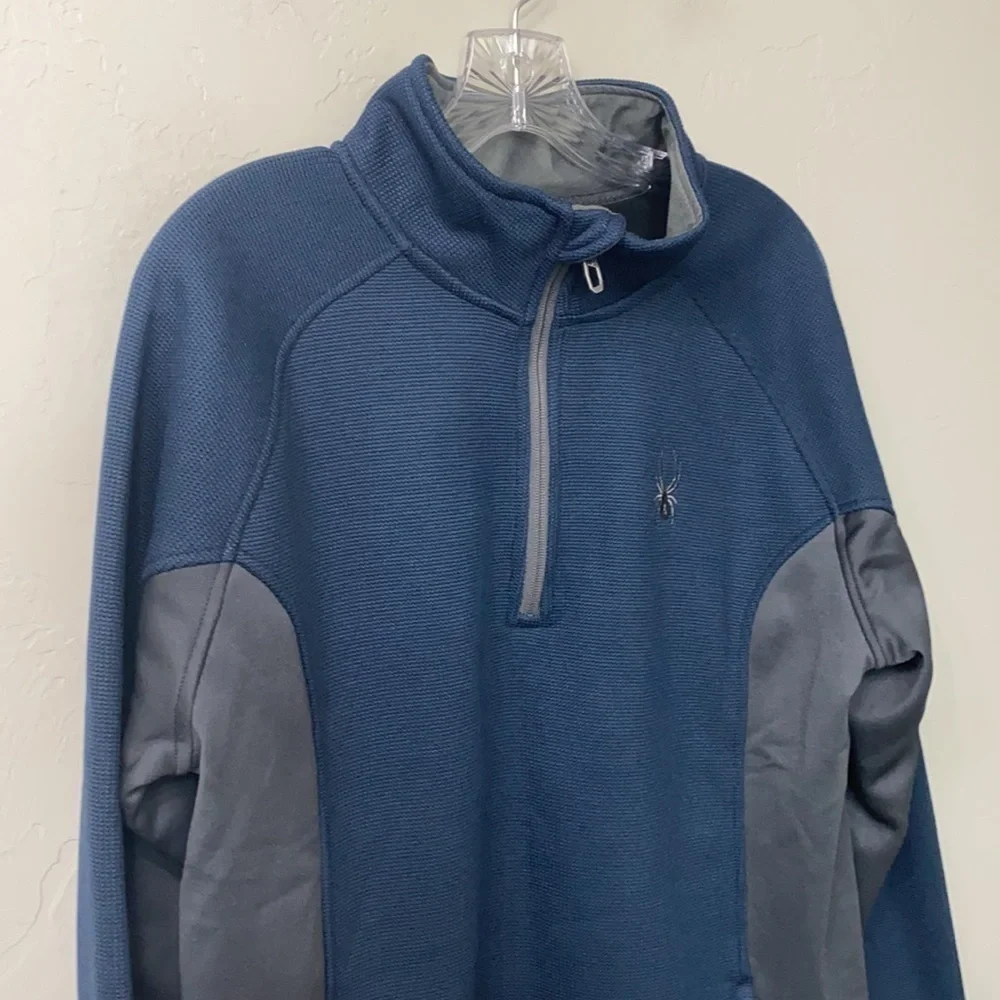 Spyder 1/4 zip Blue and gray jacket size medium.